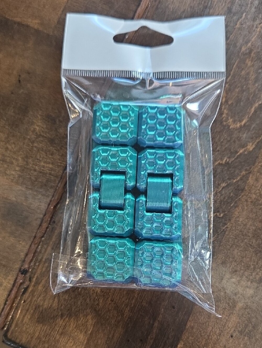 Fidget Toy With Blue And Green Accents